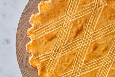 Broyé Du Poitou shortbread from above with scoring across the top.