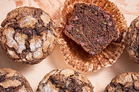 Several Chocolate Zucchini Muffins with one halved - select to zoom