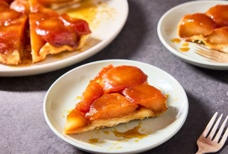 A slice of Classic Apple Tarte Tatin on a plate